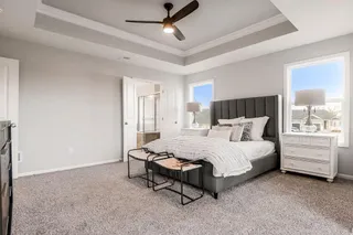 MASTER BEDROOM WITH CEILING FAN.  PHOTOS ARE OF THE ACTUAL HOME.
