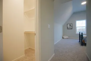 WALK IN CLOSET IN BEDROOM 4.  PHOTOS ARE OF THE ACTUAL HOME.