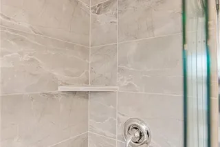 MASTER SHOWER.  PHOTOS ARE OF THE ACTUAL HOME.