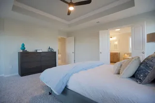 SPACIOUS MASTER BEDROOM.  PHOTOS ARE OF THE ACTUAL HOME.