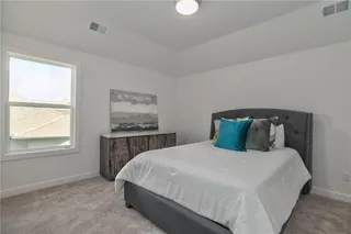 The Durham - 2 Story. Bedroom 2 connects to Bedroom 3 via a Hollywood Bath. Both Rooms have Walk In Closets. Pictures are of Previous Spec, Not Actual Home. Pictures May Feature Upgrades. Please Contact Listing Agent for Stage of Construction, Upgrades, and Available Buyer Selections.