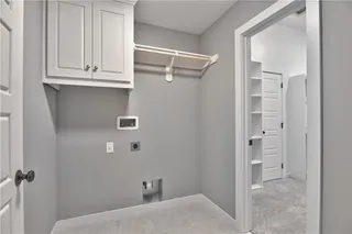 Master Closet connects to Laundry Room. PICTURE IS OF ACTUAL HOME. 