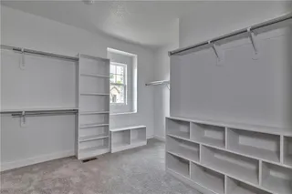 Walk In Queen Size Master Closet. Picture is of Actual Home. 