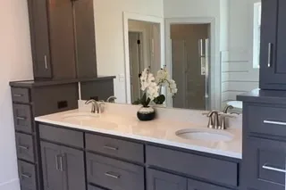 Master Bathroom double vanity. Picture is of the actual home.