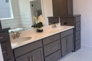 Master Bathroom double vanity. Picture is of actual home.