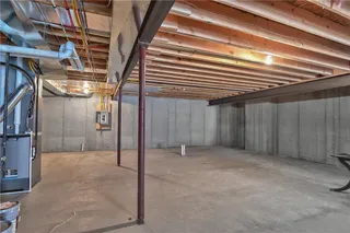 Plenty of Space to grow in this unfinished basement. Picture is of Actual Home. 