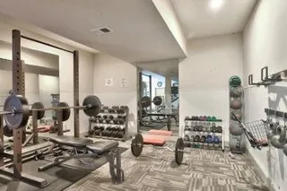 Exercise weight room at one clubhouse
