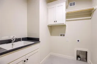 The Sonoma Reverse. Laundry Room on Main Level. Picture is of Previous Model Home, Not Actual Home.