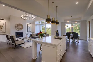 The Sonoma Reverse. Kitchen, Dining Room & Great Room. Picture is of Previous Model Home, Not Actual Home.