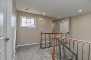 Upstairs landing.  4 bedrooms, 2 full baths, and laundry are on this level.