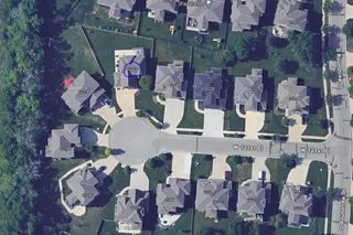 Aerial view of the home.  This home has the blue circle.