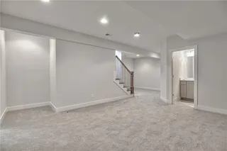 Pictures are of a Previous Model AND MAY FEATURE UPGRADES. SEVERAL BUYER SELECTIONS ARE STILL AVAILABLE. PLEASE CONTACT LISTING AGENT FOR DETAILS.Basement with light carpet