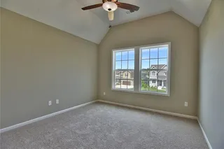 Bedroom 2. PICTURES ARE OF PREVIOUS SPEC OR MODEL HOME AND MAY FEATURE UPGRADES. NOT ACTUAL HOME.