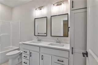 Hall Bathroom with Quartz Vanity Top and the Linen Closet provides tons of storage. Picture is of Actual Home.