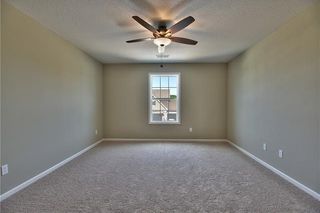 Bedroom 4. PICTURES ARE OF PREVIOUS SPEC OR MODEL HOME AND MAY FEATURE UPGRADES. NOT ACTUAL HOME.