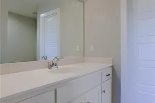 Secondary Bathroom on Upper Level. PICTURES ARE OF PREVIOUS SPEC OR MODEL HOME AND MAY FEATURE UPGRADES. NOT ACTUAL HOME.