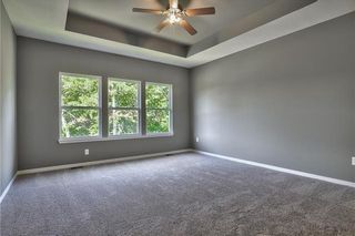 Master Bedroom. Picture is of Previous Model, Not Actual Home