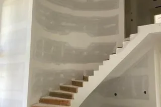 Signature Curved Stairwell to Loft area