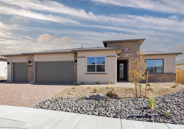 Homesite 122 Exterior with Paver Driveway and Landscaping