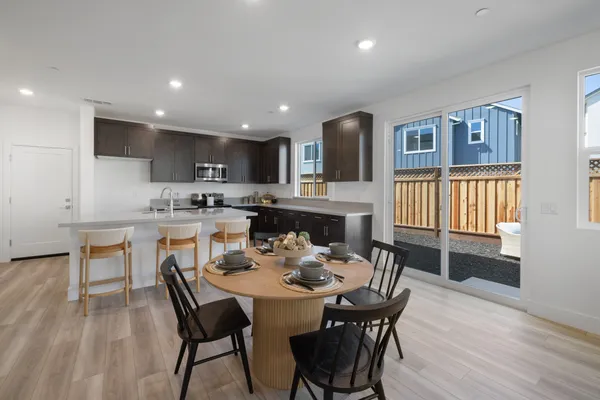 Dining nook and kitchen in Old Redwood Village Windsor Plan 3