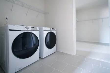 Laundry room area at The Mosaic at West Creek: Willis
