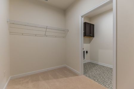 Laundry room and closet space at Elm