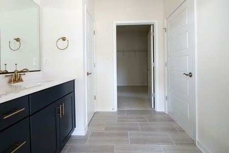 Double vanity master bathroom at The Mosaic at West Creek: Willis