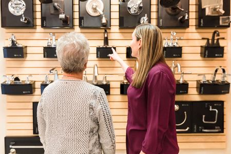 Women shopping for kitchen and bath fixture upgrades