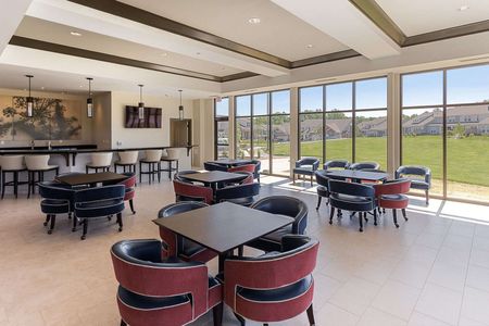 Interior view of dining area and bar at Greenwich Walk Villas at Foxcreek clubhouse