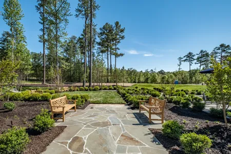 Patio Area & Walking Trails in Mosaic at West Creek Community