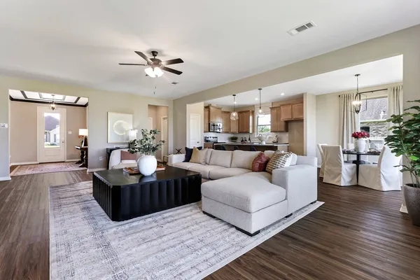 living room in a new home in water oaks community by sunrise homes