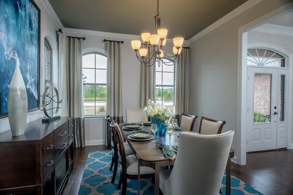 dining room in a custom home in st tammany parish by sunrise homes