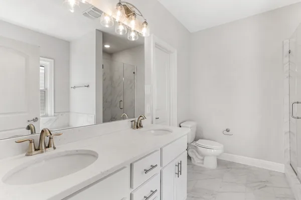 double vanity bathroom in a new home by sunrise homes