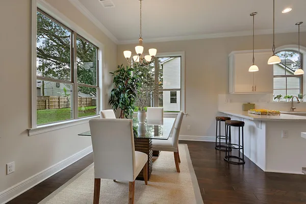 dining room in a new home in covingon la by sunrise homes