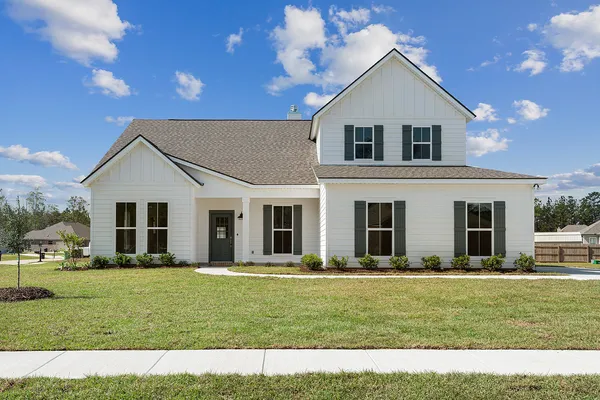 front view of a new home at water oaks in waggaman la by sunrise homes