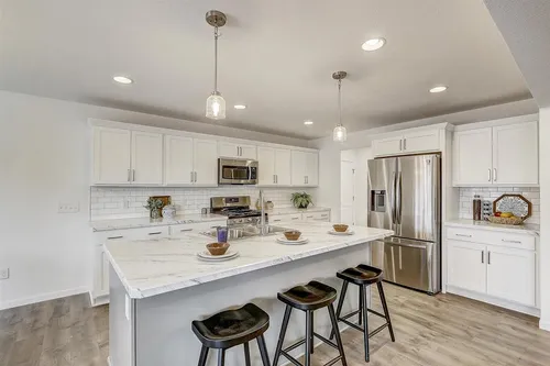 White kitchen in a new home but Tim O'Brien Homes
