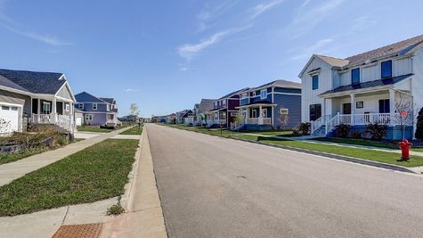 Street of new homes in Sun Prairie WI at Providence
