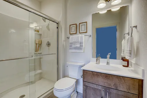 Bathroom with framed shower in a new home in Wisconsin