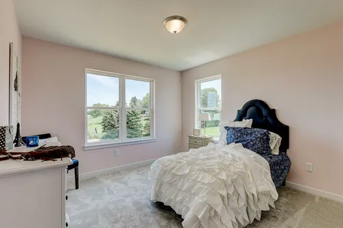 Pink bedroom in a new home in Madison WI