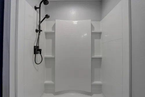 New construction home with shower and built-in shelving