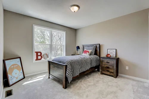 Staged bedroom in a new home in Madison WI