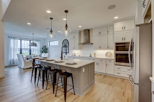 Tim O'Brien Homes white kitchen in a model home
