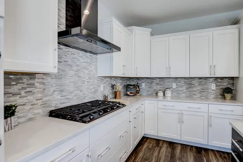 New white kitchen in a model home by Tim O'Brien