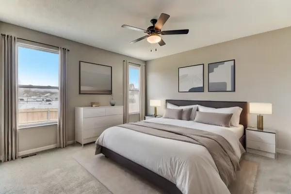 The Highly Desired & Hard To Find 1st Floor Primary Suite Offers 9ft Ceiling, Neutral, Upgraded Carpet, Ceiling Fan, a HUGE 10ft x 6ft Walk-In Closet & Adjoining Lux Bath.