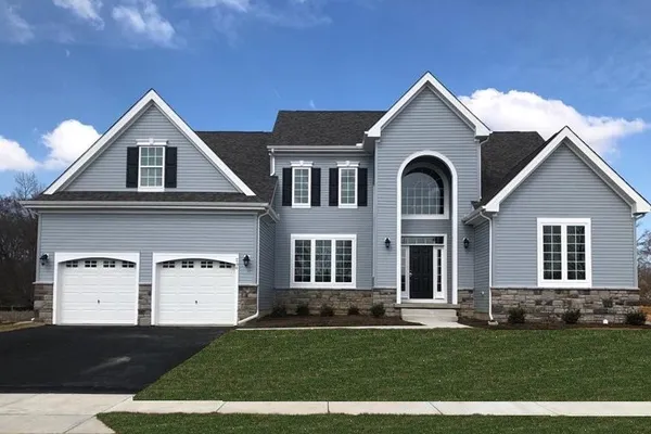 blue exterior of a new home by a home builder in delaware, wilkinson homes
