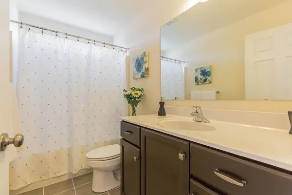 bathroom with 2 sinks in a new delaware home
