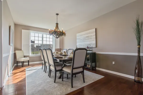 dining room in a new home in the orchards in camden de by wilkinson homes