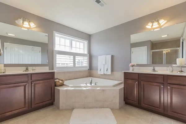 large master bathroom in a new home in the orchards in camden de by wilkinson homes