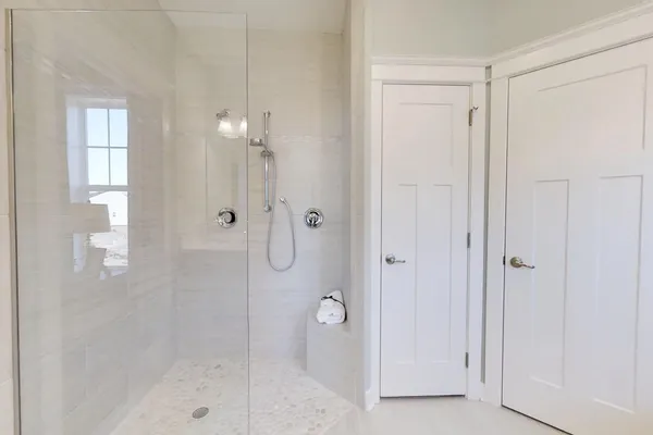 shower in a new construction home  by home builder in delaware, wilkinson homes