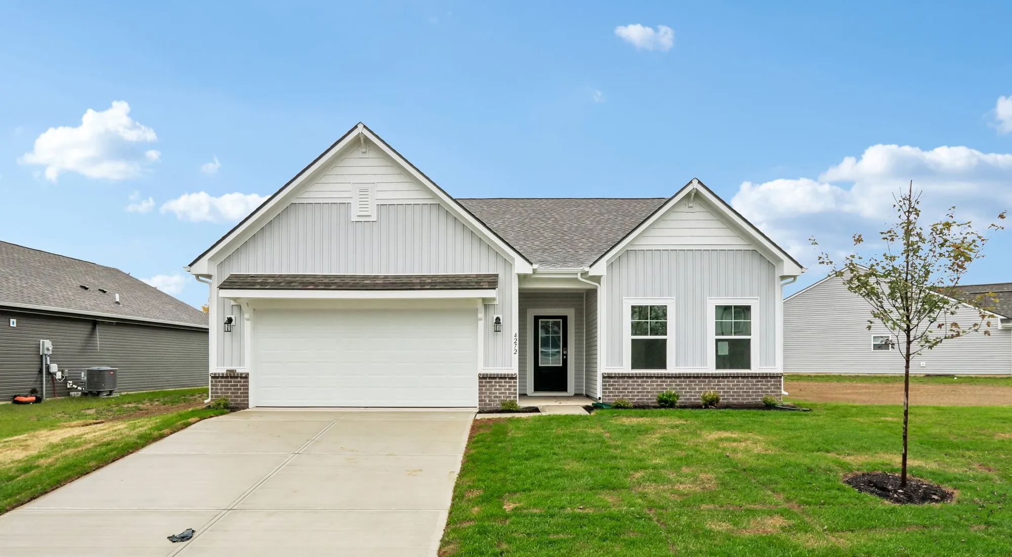 Exterior of the Chestnut by Arbor Homes, Elevation D Brick A at Abbey Commons